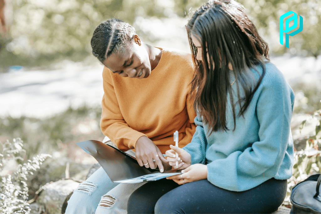 an international student in China sitting and learning with a Chinese student